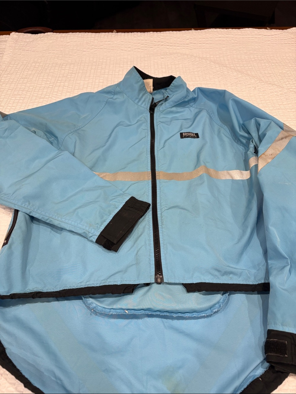 Running Room Light Blue Reflective Windbreaker Jacket 
Size S